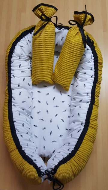 Babynest met kruikenzakken